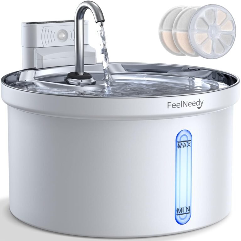 White pet water fountain with filters, water flowing from a faucet