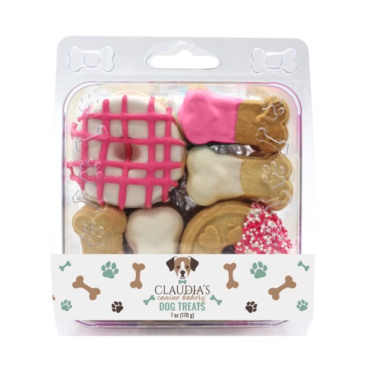 Dog treats in a clear plastic container with pink and white icing