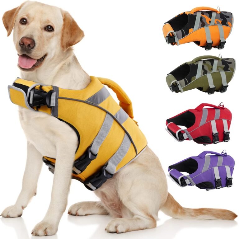 Dog wearing a yellow life vest with other colorful life vests in the background