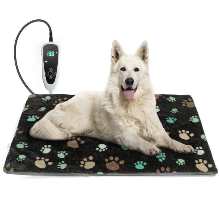 White dog lying on a paw-print heated pet bed with a controller