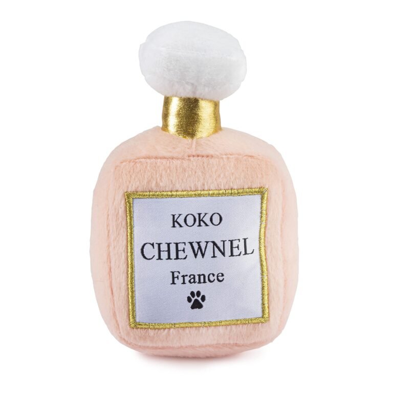 Pink plush dog toy shaped like a perfume bottle with "Koko Chewnel" label